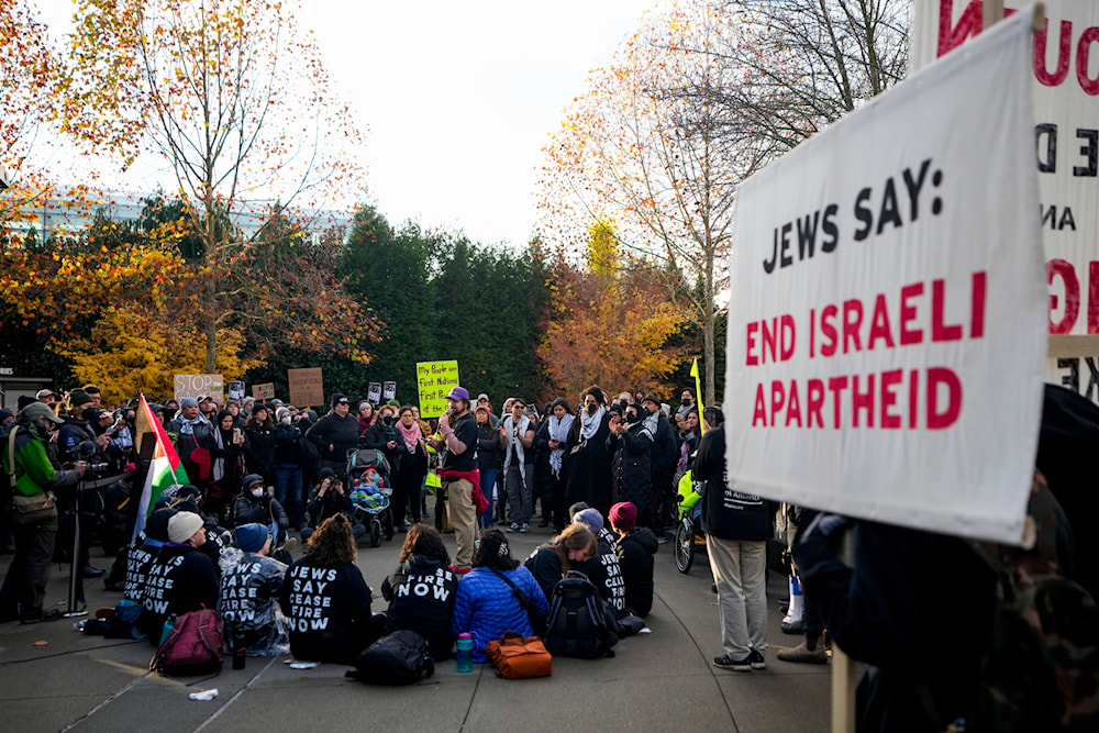Protesters gather to occupy the main entrance to the Space Needle during a rally demanding that Sen. Patty Murray, D-Wash., call for a cease-fire in the war on Gaza, Sunday, Nov. 19, 2023, in Seattle. (AP)