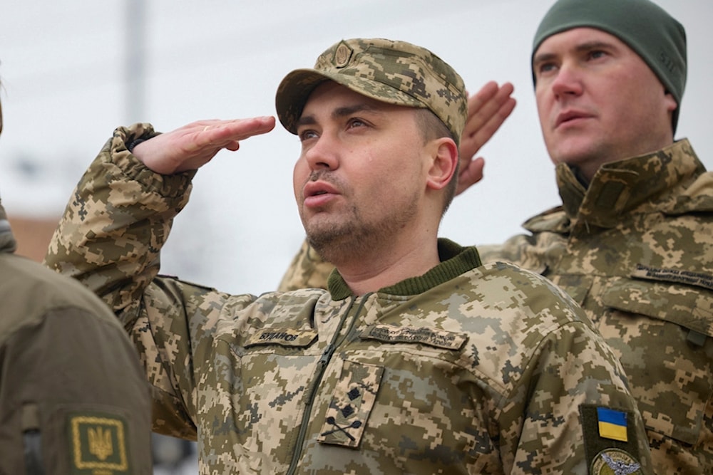 Maj. Gen. Kyrylo Budanov, Ukraine's military intelligence chief, center, attends a commemorative event on the occasion of the one year anniversary of the start of the Russian war in Ukraine in Kiev, Ukraine, on February 24, 2023 (AP)