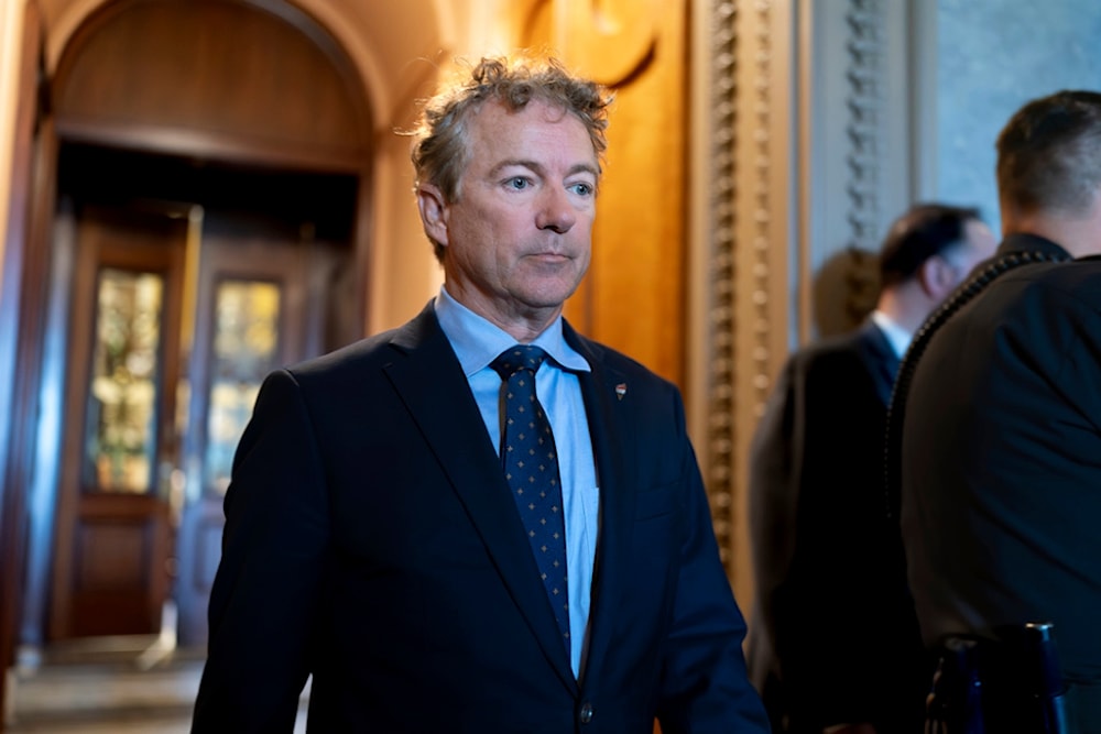 Sen. Rand Paul, R-Ky., and other senators arrive at the chamber for votes, at the Capitol in Washington, Wednesday, Sept. 6, 2023. (AP Photo/J. Scott Applewhite)