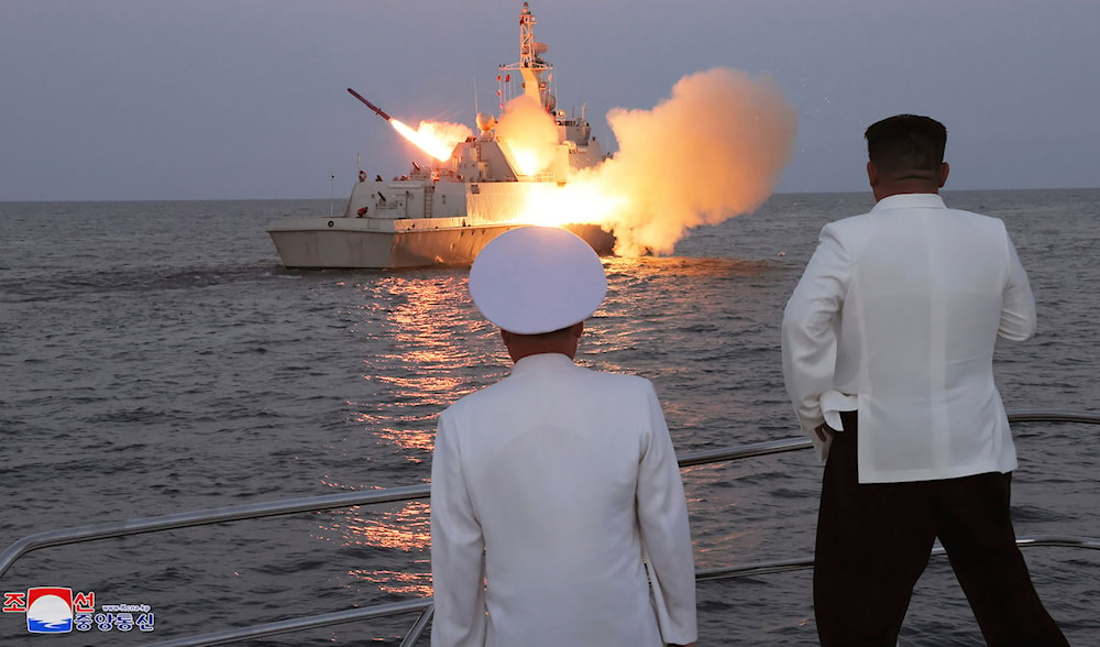 In this undated photo provided on Aug. 21, 2023, by the North Korean government, North Korean leader Kim Jong Un observes a test-firing of strategic cruise missiles. (KCNA via AP)