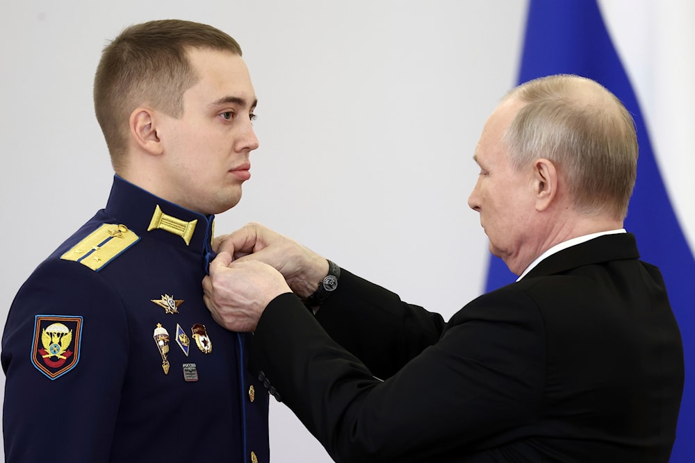 Russian President Vladimir Putin during a ceremony at the St. George Hall of the Grand Kremlin Palace in Moscow, Russia, Friday, Dec. 8, 2023. (Valery Sharifulin, Sputnik, Kremlin Pool Photo via AP)