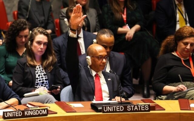 US Ambassador Alternate Representative of the US for Special Political Affairs in the United Nations Robert A. Wood raises his hand during a United Nations Security Council meeting on Gaza, at UN headquarters in New York City on December 8, 2023. (AFP)
