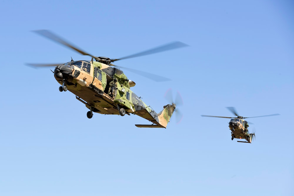 Four Australian army personnel lost at sea after ejecting from chopper ...