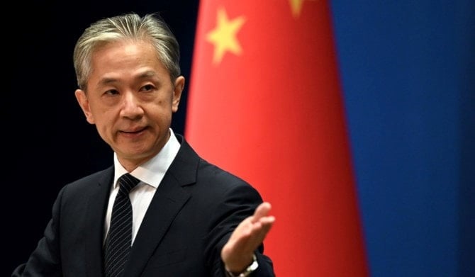 Chinese Foreign Ministry spokesperson Wang Wenbin gestures during a press conference at the Ministry of Foreign Affairs in Beijing on August 8, 2022. (AFP)