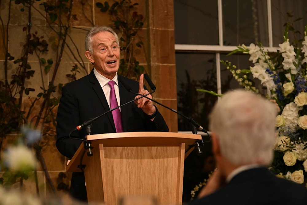 Former British Prime Minister Sir Tony Blair gives a speech at Hillsborough Castle, in Belfast, Wednesday, April 19, 2023. (Pool Photo via AP)