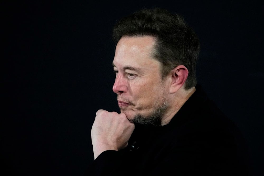 Tesla and SpaceX's CEO Elon Musk pauses during an in-conversation event with Britain's Prime Minister Rishi Sunak in London, Thursday, Nov. 2, 2023 (AP)