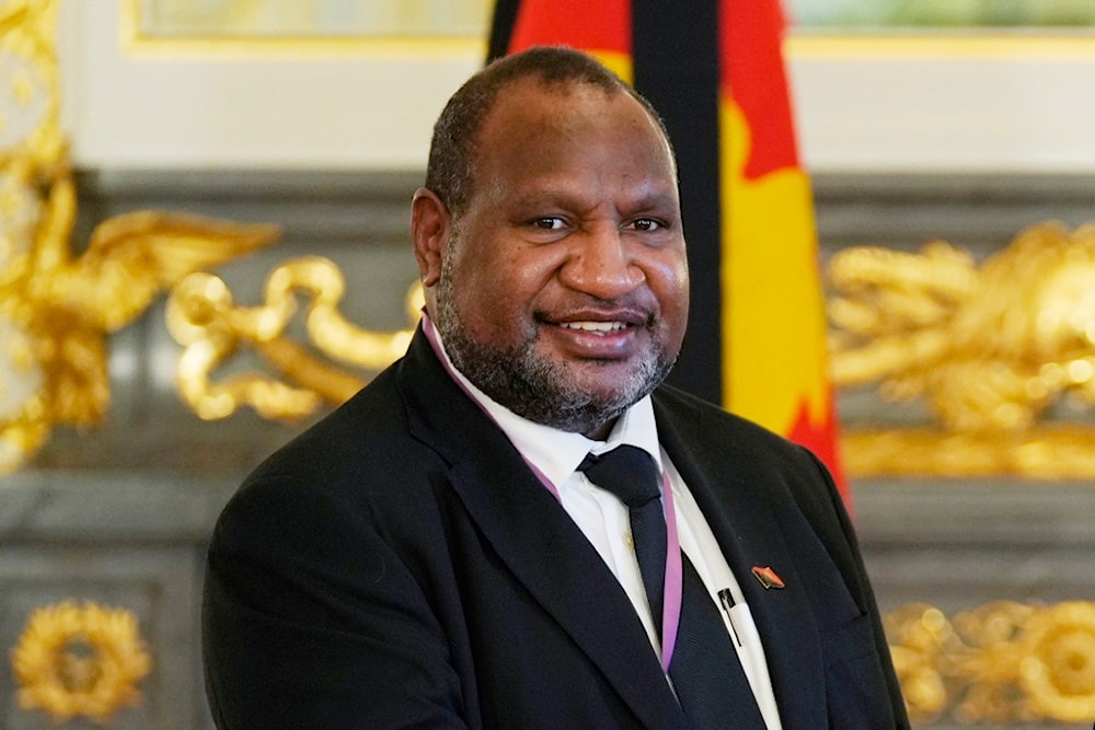 Papua New Guinean Prime Minister James Marape poses for a photo at Akasaka Palace state guest house in Tokyo on Sept. 27, 2022. (AP)