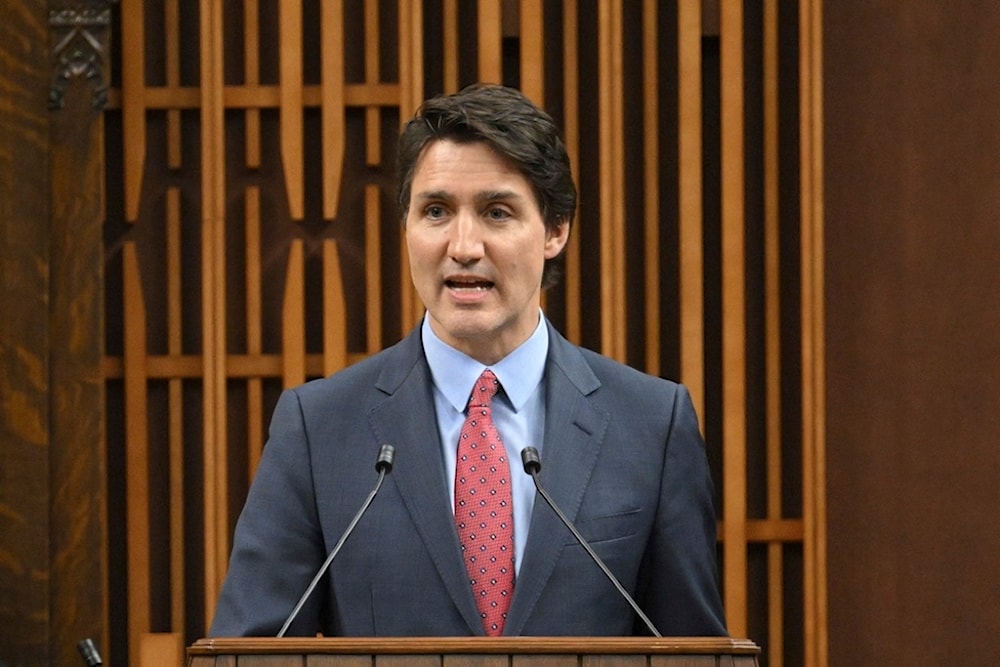 Canadian Prime Minister Justin Trudeau addresses the Canadian Parliament before President Joe Biden speaks in Ottawa, Canada, Friday, Mach 24, 2023. (Mandel Ngan/Pool via AP)