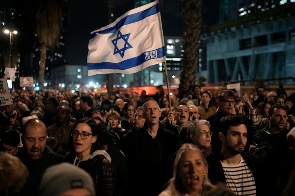 People attends a demonstration calling for the release of the hostages taken by Hamas militants into the Gaza Strip at the 'Hostages Square' in 'Tel Aviv', 'Israel', Saturday Jan. 13, 2024. (AP)