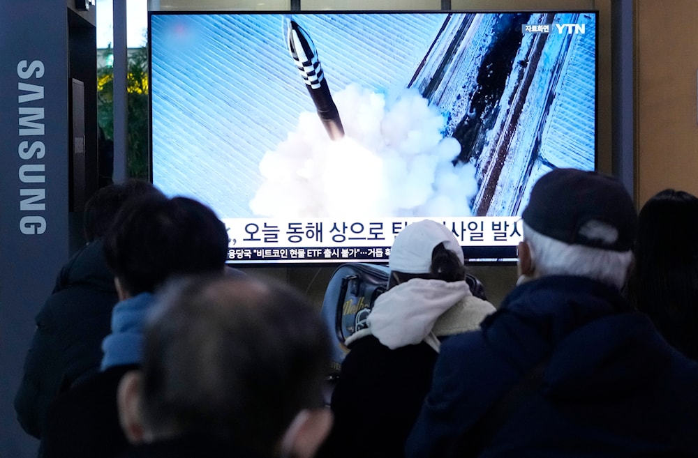 A TV screen shows a file image of North Korea's missile launch during a news program at the Seoul Railway Station in Seoul, South Korea, Sunday, Jan. 14, 2024. (AP)