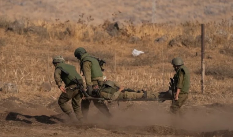 Na undated image showing Israeli occupation forces evacuating an injured soldier. (Social media)