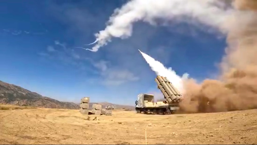 This image taken from video footage provided by Iranian military on Thursday, Sept. 29, 2022, missiles launch during an attack targetting the Iraqi Kurdish region (Iranian military via AP)