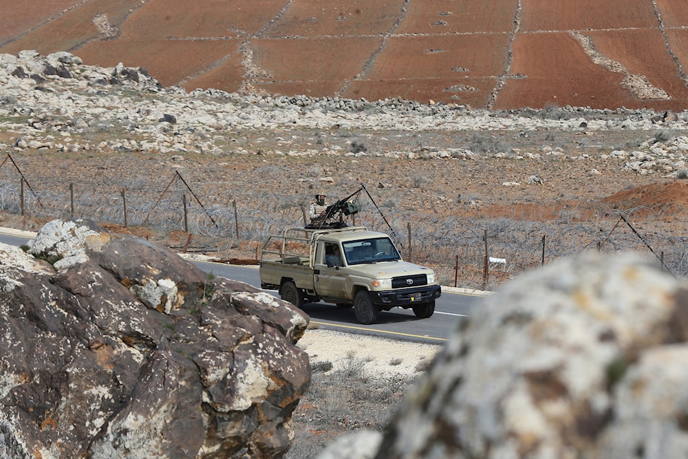 Jordanian soldiers patrol along the eastern Jordan-Syria border, in al-Washash, Mafraq governorate, Jordan, February 17, 2022 (AP)