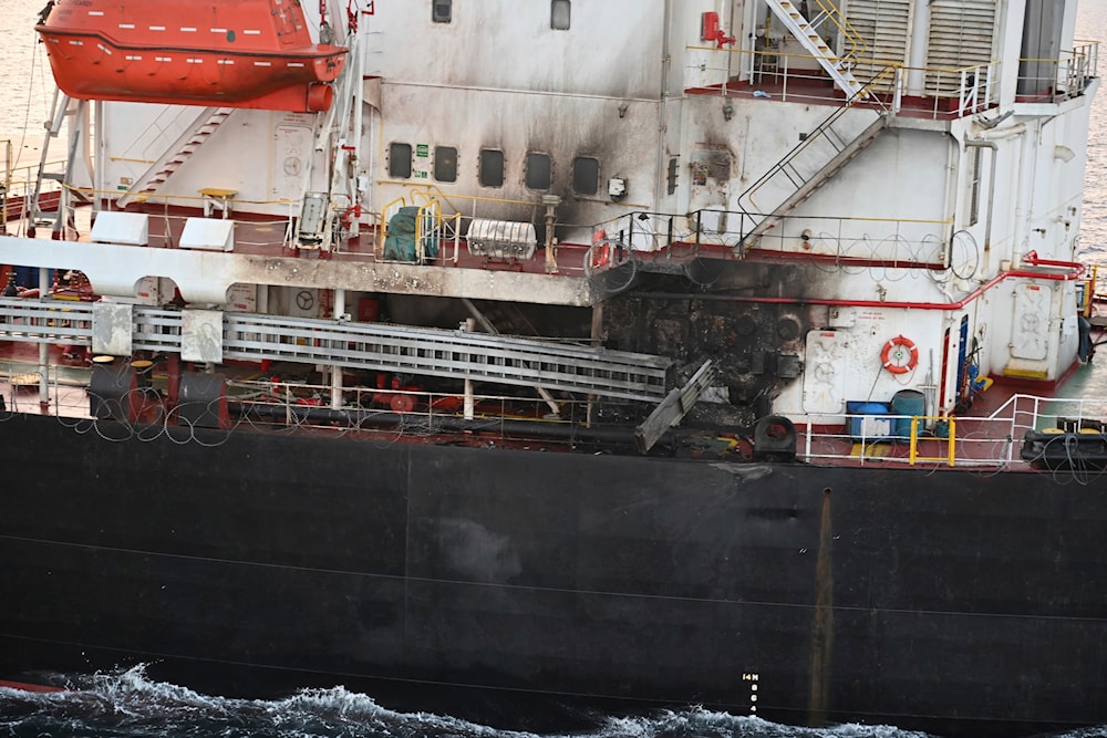 This photograph provided by the Indian Navy shows US-owned ship Genco Picardy that came under attack from a bomb-carrying drone launched by the Yemeni Armed Forces in the Gulf of Aden, January 18, 2024 (AP)