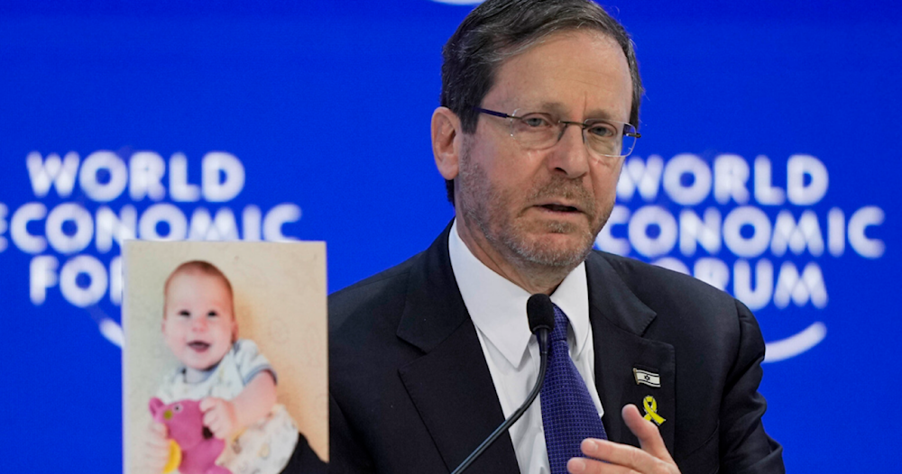 Herzog accused of war crimes at Davos