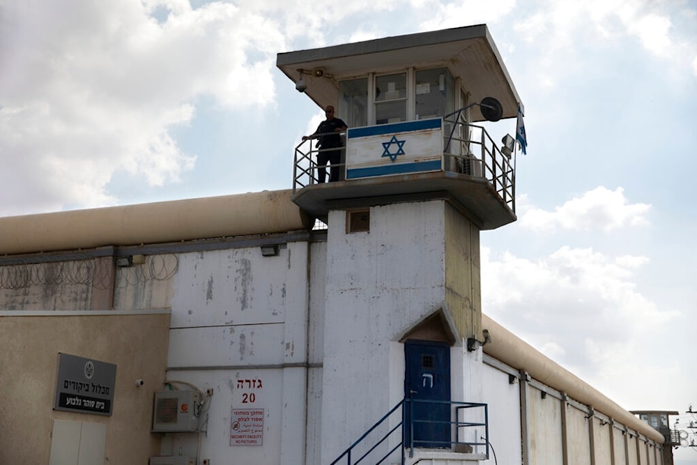 An Israeli occupation prison guard stands at the Gilboa prison in northern occupied Palestine, Monday, Sept. 6, 2021. (AP)