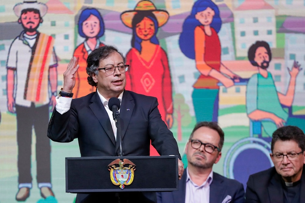 Colombian President Gustavo Petro holds a ceremony to formally begin a six-month cease-fire as part of a process to forge permanent peace with the National Liberation Army (ELN), in Bogota, Colombia, Aug. 3, 2023. (AP)