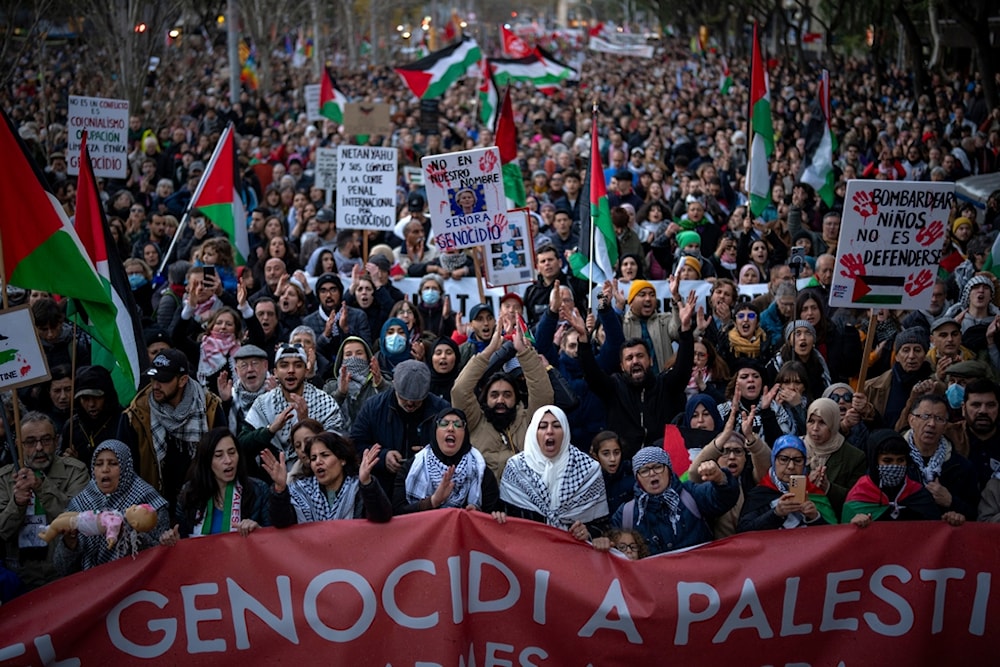 People march during a protest in support of Palestinians and calling for an immediate ceasefire in Gaza, in Barcelona, Saturday, Jan. 20, 2024 (AP Photo/Emilio Morenatti)