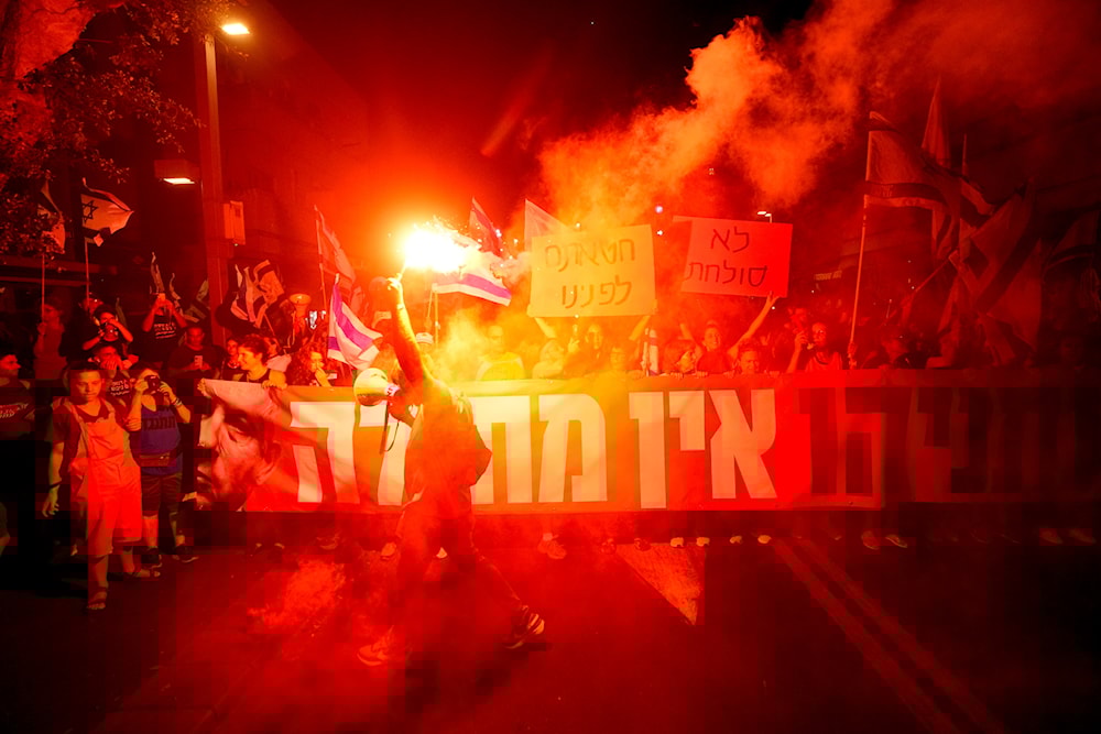 Settlers protest against plans by Prime Minister Benjamin Netanyahu's government to overhaul the judicial system in Tel Aviv, Occupied Palestine, Saturday, Sept. 23, 2023.(AP)