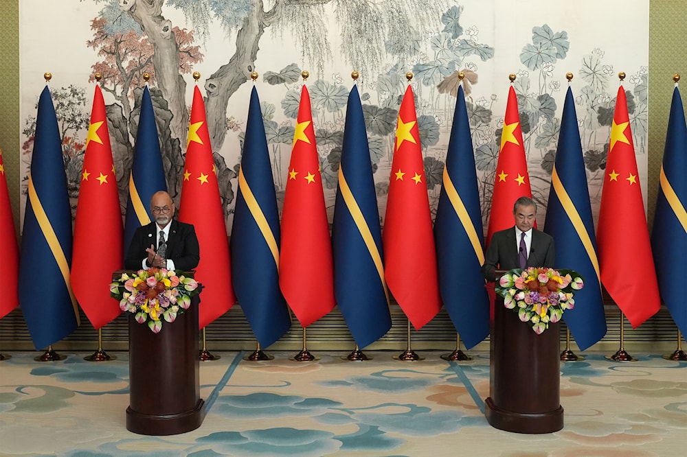 Chinese Foreign Minister Wang Yi, and Minister of Foreign Affairs and Trade of Nauru Lionel Aingimea speak after signing a joint communique on the resumption of diplomatic relations between both countries  in Beijing, Jan. 24, 2024(AP)