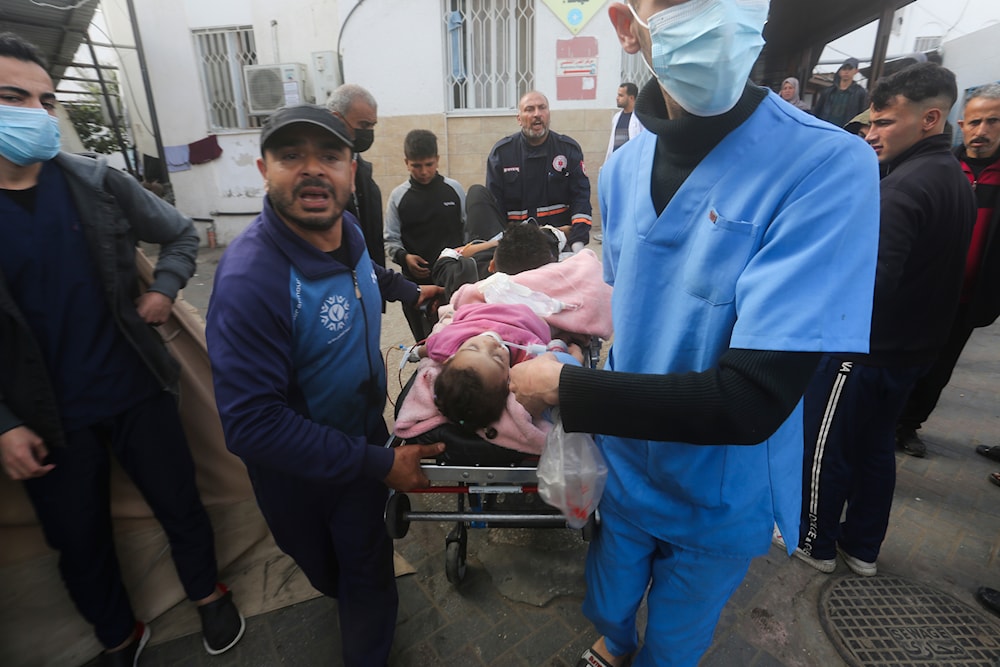 Palestinians wounded during the Israeli air and ground offensive in Khan Younis are brought to a hospital in Rafah, Gaza Strip, Tuesday, Jan. 23, 2024(AP)