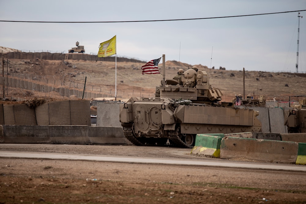 American soldiers patrol near a prison in al-Hassakah, Syria, February 8, 2022 (AP)