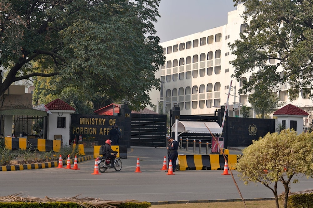 Police officers stand guard at the main entry gate of Pakistan's Ministry of Foreign Affairs, in Islamabad, Pakistan, Thursday, Jan. 18, 2024. (AP)