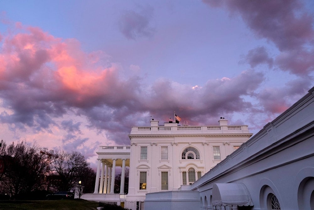 The White House is seen at sunset in Washington, Friday, Jan. 26, 2024. (AP Photo/Andrew Harnik)