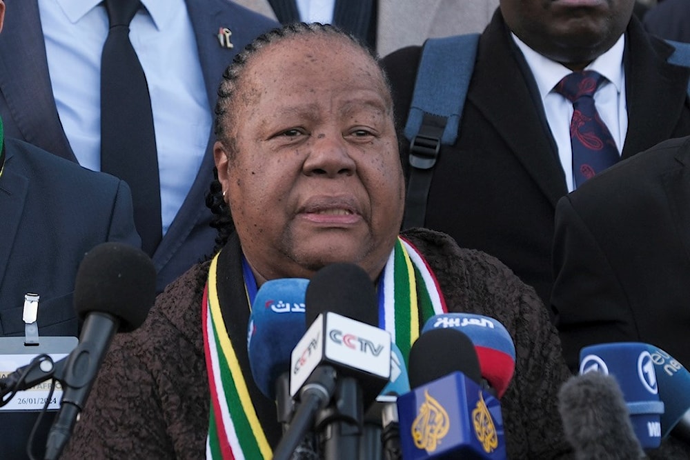 South Africa's Foreign Minister Naledi Pandor addresses reporters after a session of the International Court of Justice in The Hague, Netherlands, Friday, Jan. 26, 2024 (AP)