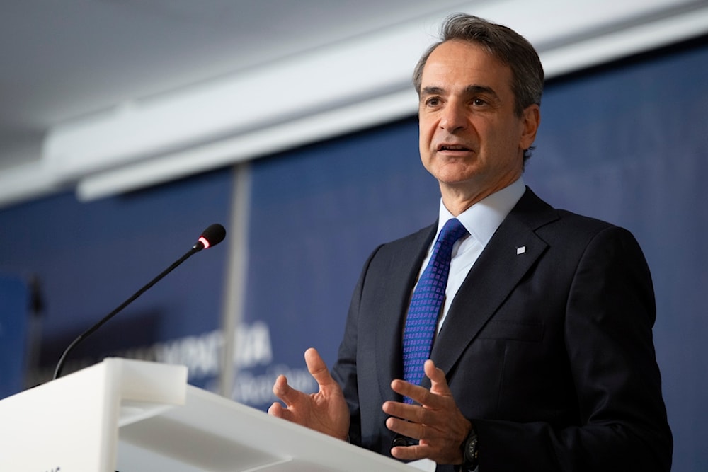 Greece's Prime Minister Kyriakos Mitsotakis speaks at a panel discussion on migration in Athens, Greece, on Monday, Jan. 8, 2024 (AP)