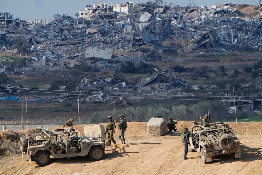 Israeli soldiers take up positions near the Gaza Strip border, in southern Israel, Friday, Dec. 29, 2023 (AP)