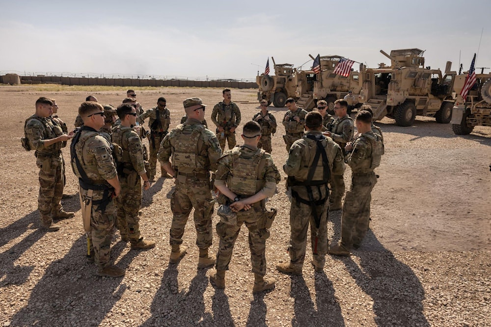 US occupation soldiers prepare to go out on patrol from a remote combat outpost on May 25, 2021, in northeastern Syria (AFP)