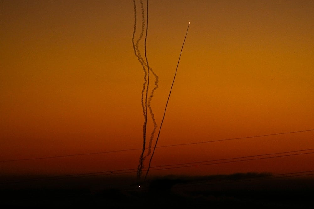 Rockets are fired toward Israel from the Gaza Strip, as seen from southern occupied Palestine, Friday, Dec. 15, 2023. (AP)