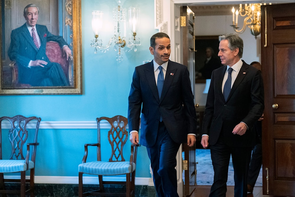 Secretary of State Antony Blinken and Qatar's Prime Minister and Foreign Affairs Minister Mohammed Bin Abdulrahman Al Thani, walk to the Treaty Room at the State Department, January 29, 2024, in Washington, DC (AP)