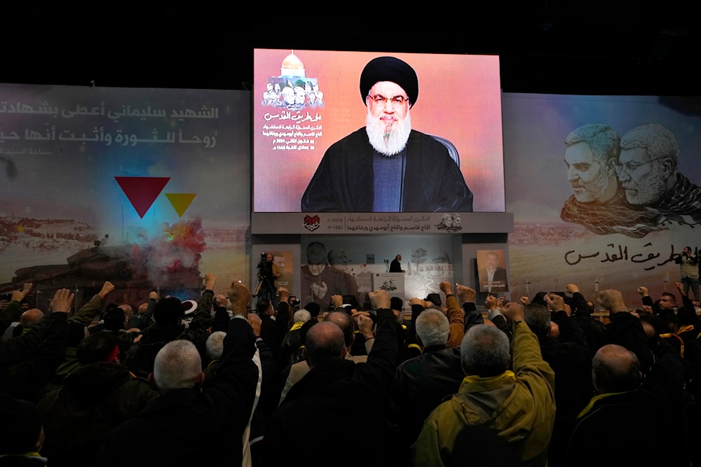 Hezbollah leader Sayyed Hassan Nasrallah speaking during a ceremony to mark the fourth anniversary of the assassination of martyrs Qassem Soleimani and Abu Mahdi al-Muhandis, in the southern suburbs of Beirut, Lebanon, January 3, 2024 (AP)