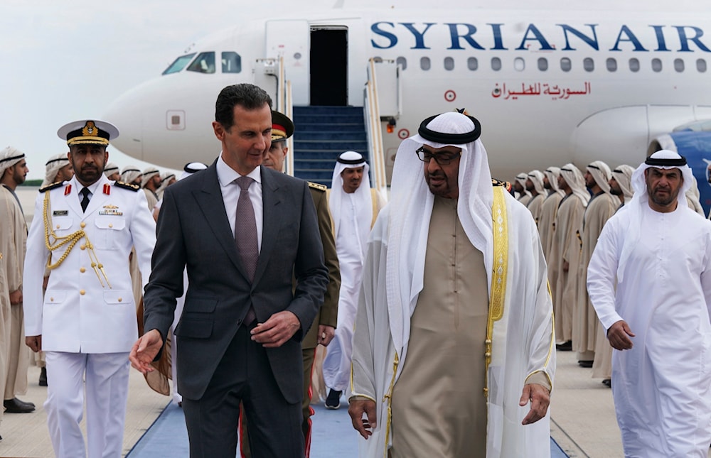  In this photo released by the Syrian Presidency, Syrian President Bashar Assad, left, speaks with UAE President Sheikh Mohammed bin Zayed al-Nahyan, in in Abu Dhabi, United Arab Emirates, March 19, 2023 (AP)