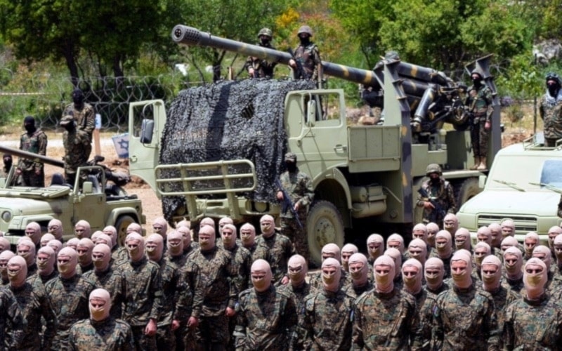 Hezbollah Resistance fighters during a public exercise in Aramta village in Jezzine district, southern Lebanon, on May 21, 2022 (AFP)