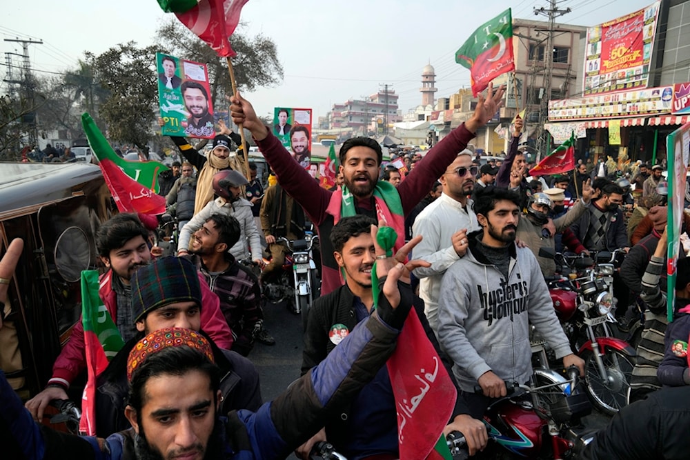 Supporters of former prime minister Imran Khan and political party Pakistan Tehreek-e-Insaf (PTI) attend an election campaign rally in Lahore, Pakistan, Sunday, Jan. 28, 2024.(AP)