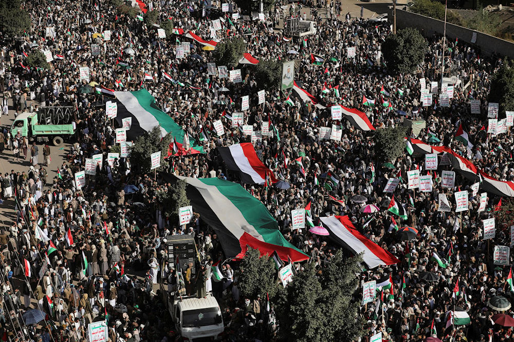 People rally to protest against the Israeli air strikes on the Gaza Strip, in Sanaa, Yemen (Khaled Abdullah/Reuters)