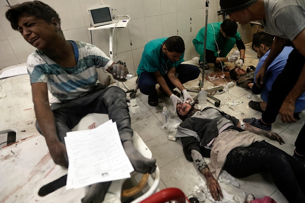 Palestinians wounded in the Israeli bombardment of the Gaza Strip receive treatment at the Nasser hospital in Khan Younis, Southern Gaza Strip, Sunday, Dec. 31, 2023. (AP)