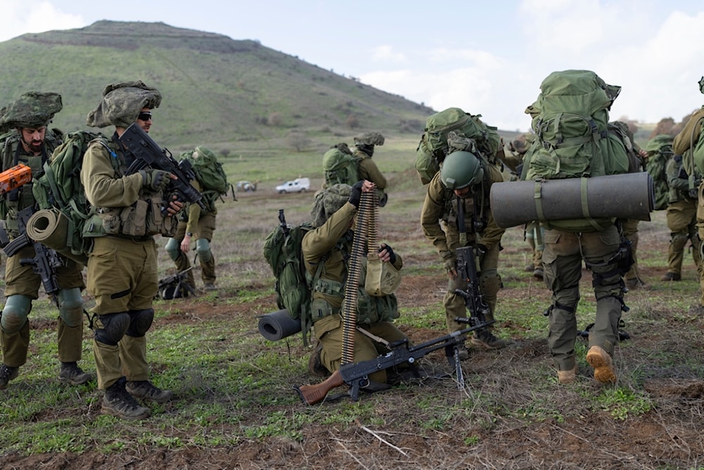 Israeli combat reservists and tank forces take part in training drills on the Lebanese front in the occupied Golan Heights, Thursday, Jan. 4, 2024. (AP Photo)
