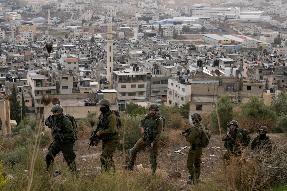 Israeli soldiers are seen during a military operation in the Balata refugee camp, West Bank, Sunday, Nov. 19, 2023. (AP)