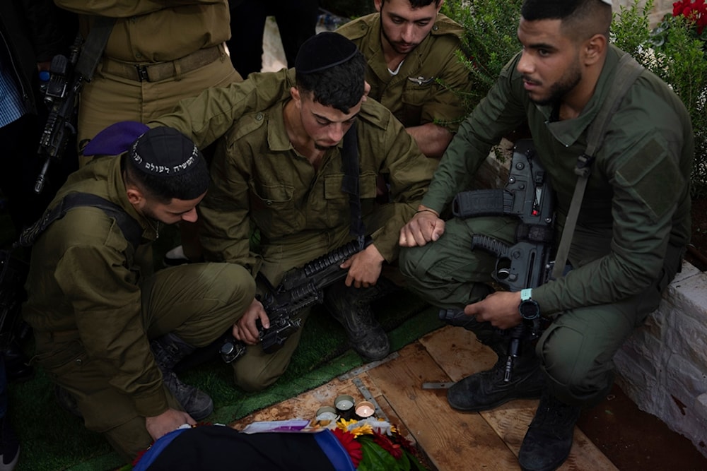 Israeli soldiers at a soldier's funeral at 'Kiryat Shaul' cemetery in 