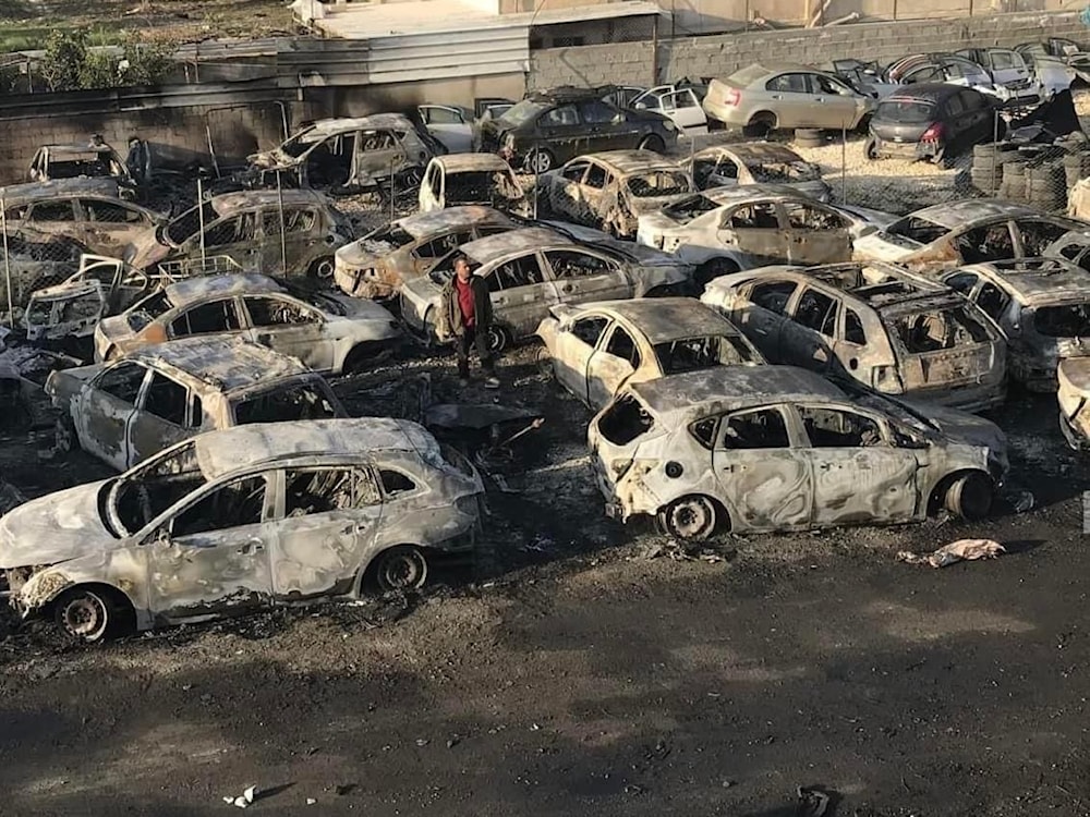 A number of destroyed vehicles in Huwara, Nablus, after it was attacked by Israeli settlers on February 26, 2023. (Social media)