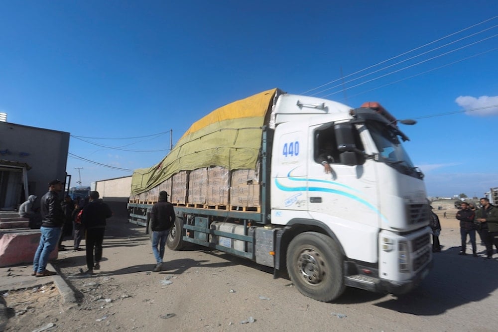 Humanitarian aid trucks enter the Gaza Strip from the occupied territories through the 