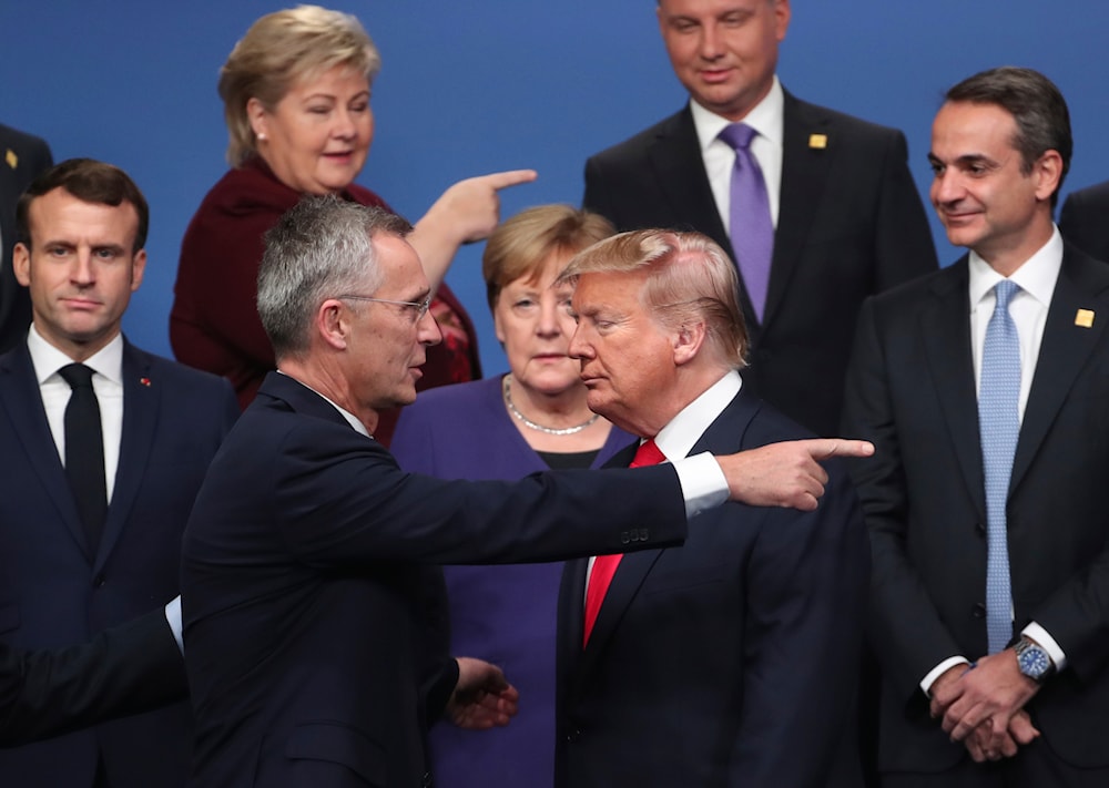 NATO Secretary General Jens Stoltenberg, center front left, speaks with then-U.S. President Donald Trump at a NATO leaders’ meeting in England, Dec. 4, 2019. (AP)