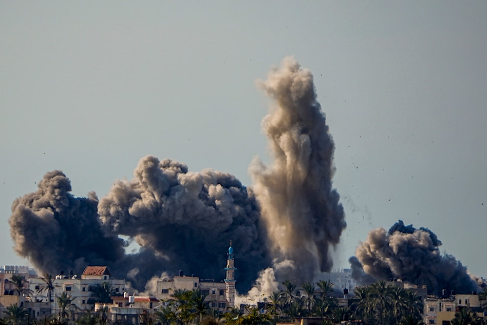 Smoke and explosion following an Israeli bombardment inside the Gaza Strip, as seen from the other side of the 'border', Sunday, Feb. 11, 2024. (AP)