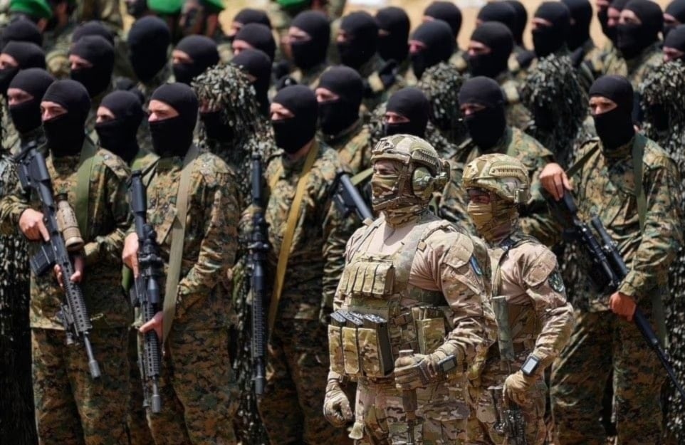 Hezbollah Resistance fighters carry out a training exercise in Aaramta village in Jezzine, southern lebanon , on Sunday, May 21,2023 (AP)