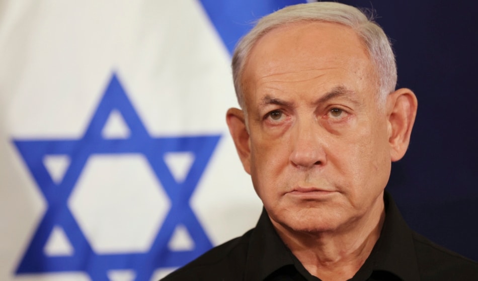 Israeli occupation's Prime Minister Benjamin Netanyahu attends a press conference in a military base in 'Tel Aviv', 'Israel', Saturday, Oct. 28, 2023. (AP)