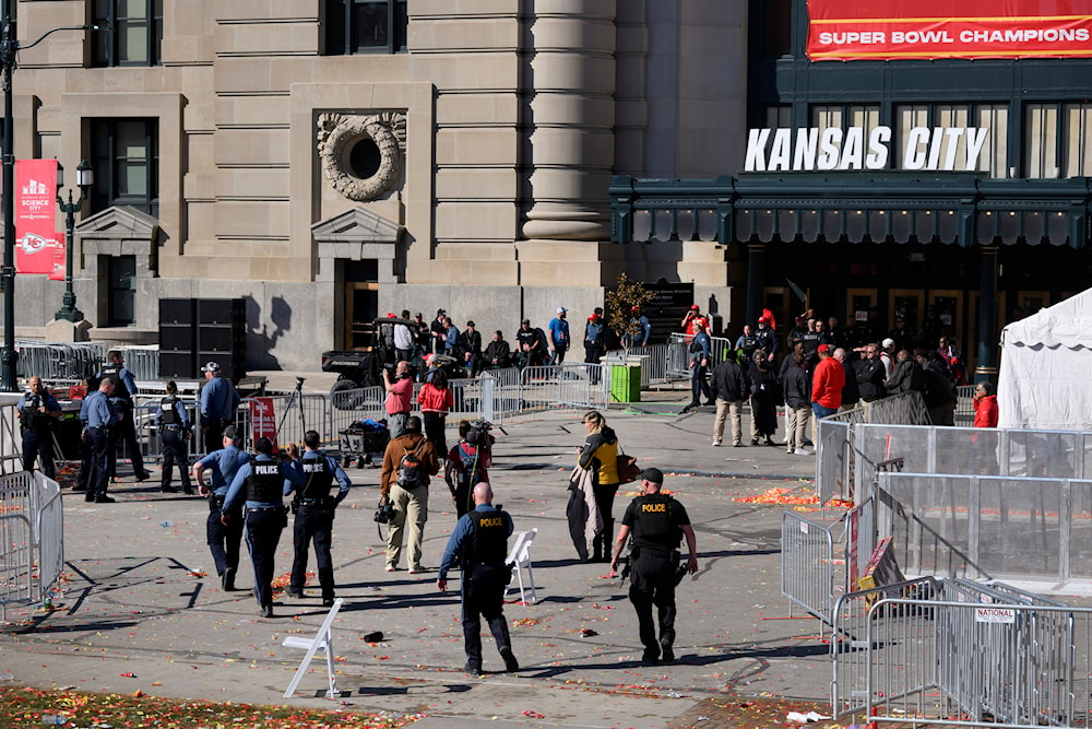 Law enforcement personnel approach Union Station following a shooting at the Kansas City Chiefs NFL football Super Bowl celebration in Kansas City, Mo., February 14, 2024. (AP)